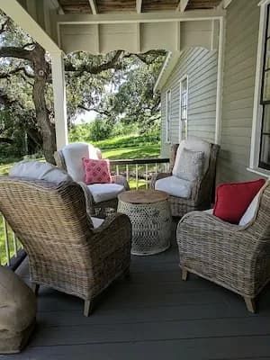 Guests gathering on the front porch at Round Top Inn